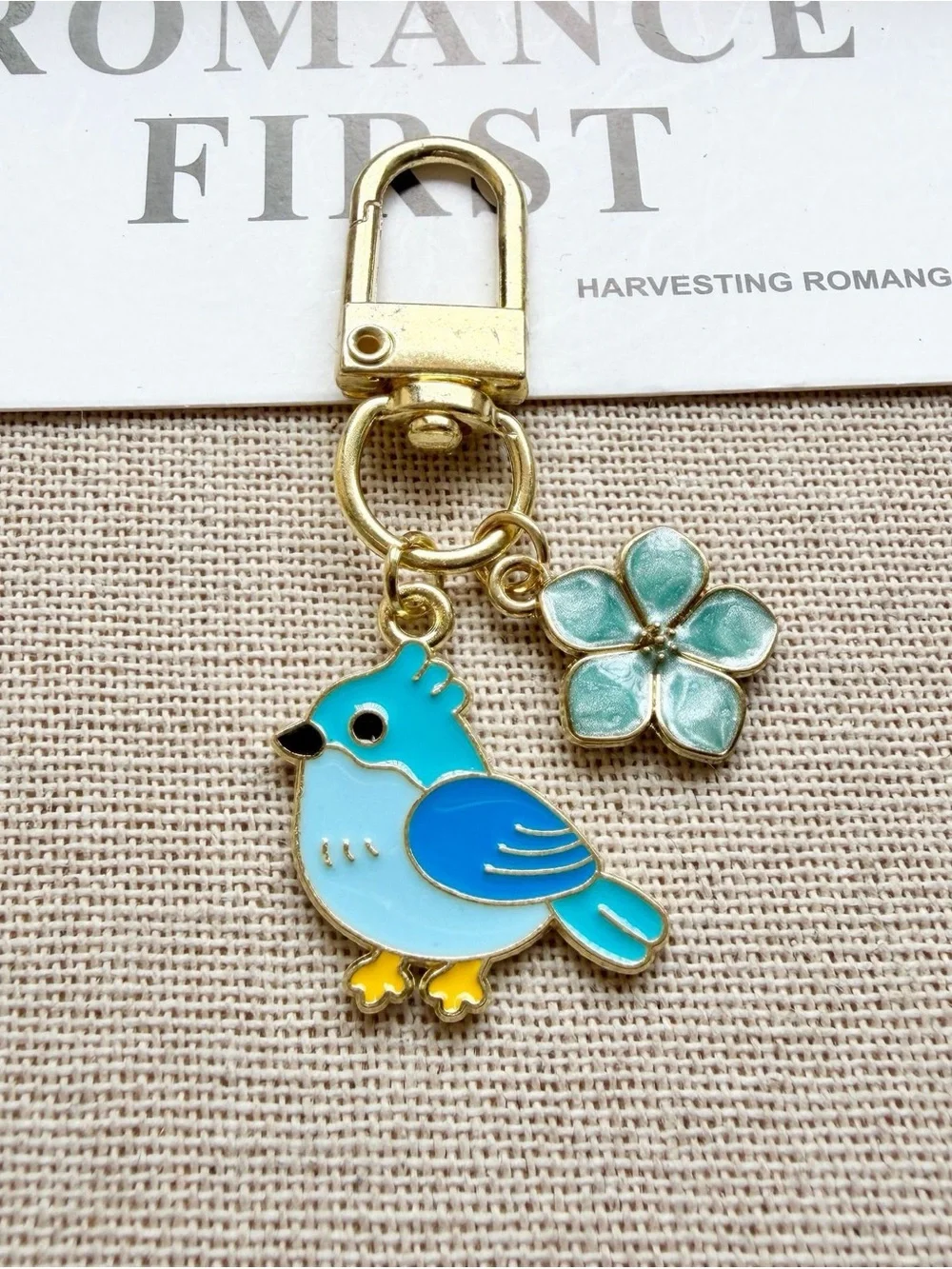 Gold Blue Bird Enamel Keychain with Flower Charm - Cute Pet Bird Accessory